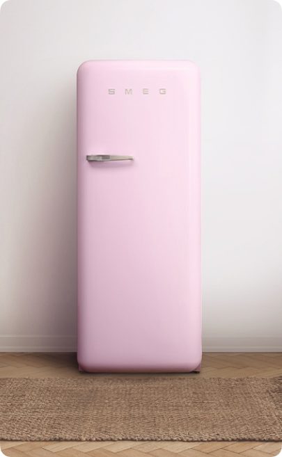 A pink retro Smeg fridge with heavily rounded corners.